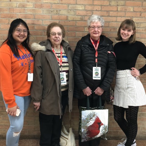 Peer Leadership Students Amanda and Elisabeth with Retired Nurses Mary Jo and Barbara at the DHS Career Center